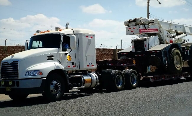alquiler cargador frontal transporte